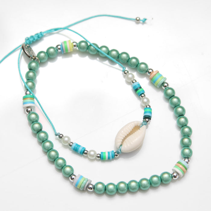 Cowrie Couplet